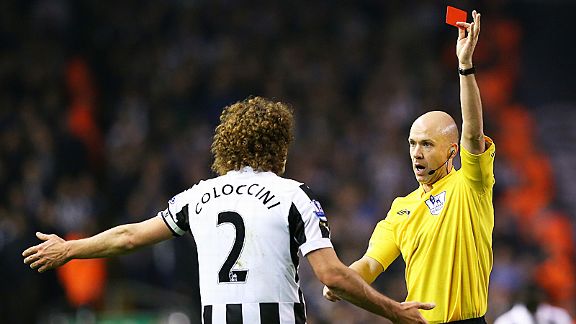 Fabricio Coloccini is dismissed by referee Anthony Taylor for his challenge on Luis Suarez