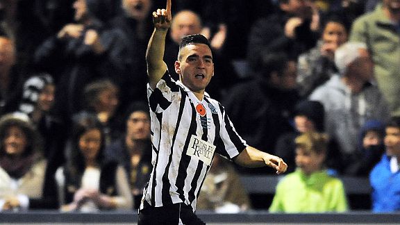 Jake Gosling celebrates the goal which sent Dorchester into the second round