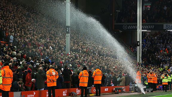 Liverpool fans are accidently soaked at half-time when a sprinkler went off