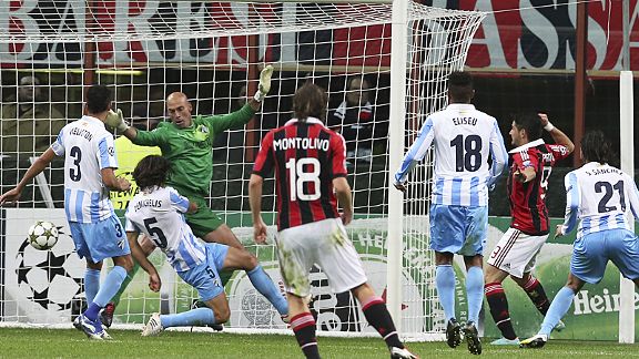 Alexandre Pato (r) earns AC Milan a 1-1 draw against Malaga