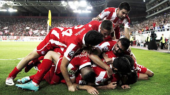Olympiakos celebrate after Leandro Greco scored their second goal in a crucial 3-1 win over Montpellier