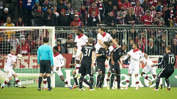 Lille's Florent Balmont deflects Arjen Robben's free-kick past his own goalkeeper for Bayern's third