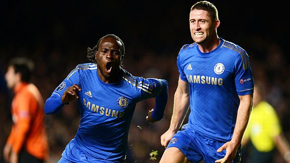 Victor Moses celebrates with Gary Cahill after scoring Chelsea's late, late winner against Shakhtar