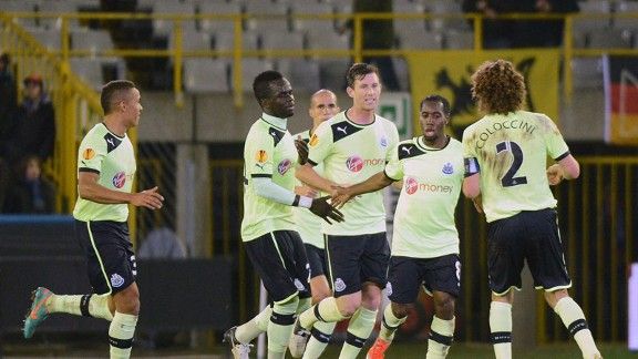 Newcastle's Vurnon Anita is mobbed following his goal against Club Brugge