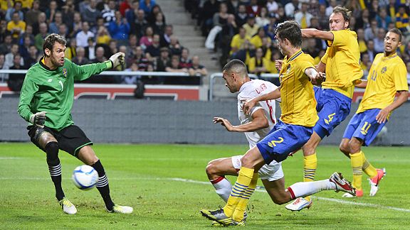 Steven Caulker puts England 2-1 in front against Sweden from Steven Gerrard's free-kick