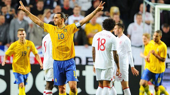 Zlatan Ibrahimovic celebrates after completing his hat-trick against England