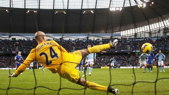Carlos Tevez beats Ben Howard from the spot to bring Man City level against Everton