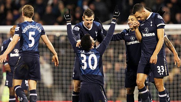 Spurs celebrate after Sandro scored a late goal to put his side in front at Fulham