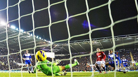 Wayne Rooney scores his second goal of the game for Manchester United at Reading
