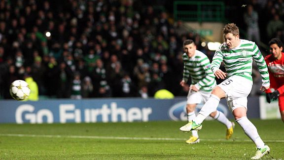 Kris Commons blasts home from the penalty spot to put Celtic into the next round of the Champions League