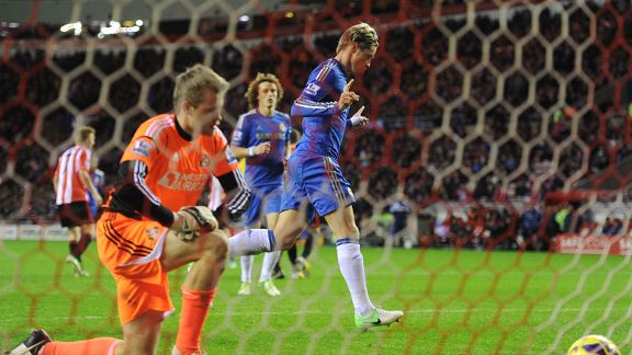 Fernando Torres celebrates netting a penalty to put Chelsea 2-0 ahead