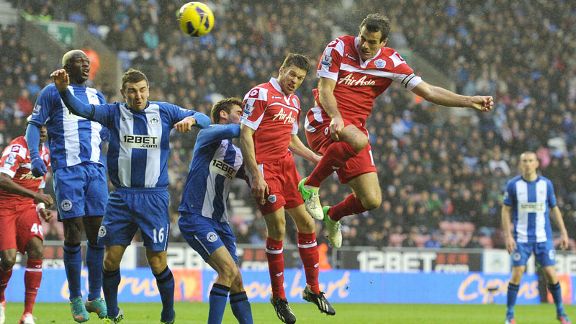 Ryan Nelsen heads home an equaliser for Queens Park Rangers