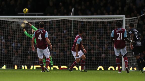 Glen Johnson watches on as his strike gives Liverpool the lead against West Ham