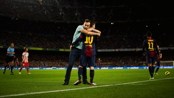 Lionel Messi hugs pitch invader 