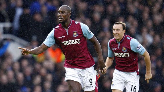 Carlton Cole celebrates after breaking the deadlock against Everton