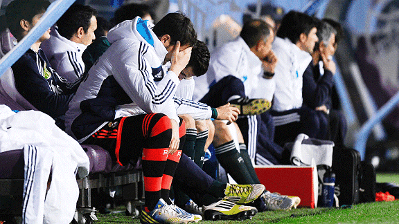 Iker Casillas is dejected on the bench after being dropped as Real crash at Malaga