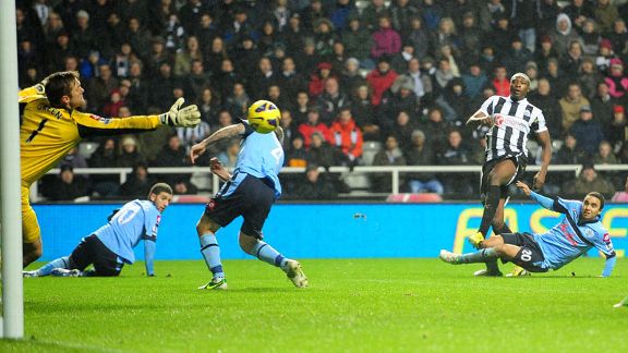 Shola Ameobi fires Newcastle into the lead against QPR