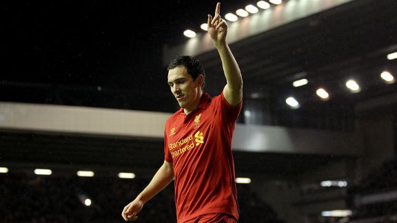 Stewart Downing celebrates after netting his first Premier League goal for Liverpool