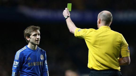 On his Premier League debut Marko Marin is lucky to escape with just a caution after fouling QPR's Stephane Mbia 