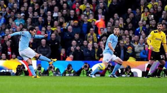 Carlos Tevez fires Manchester City into an early lead against Watford