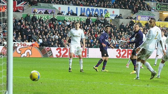 Lukas Podolski's swivel, turn and shot brought Arsenal level at Swansea