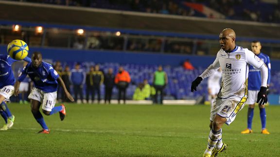 El-Hadji Diouf scored for Leeds as they earned an FA Cup fourth round tie with Spurs