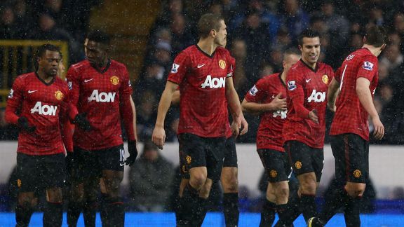Manchester United celebrate taking the lead at Tottenham through Robin van Persie