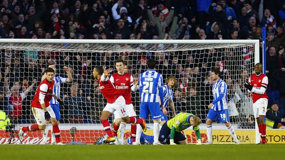 Theo Walcott celebrates after netting the winning goal