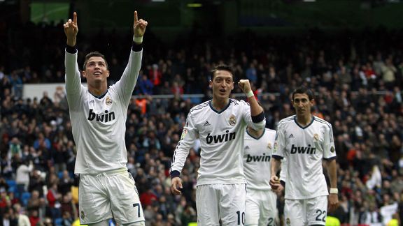 Cristiano Ronaldo netted a ten-minute hat-trick to ease Real Madrid to victory