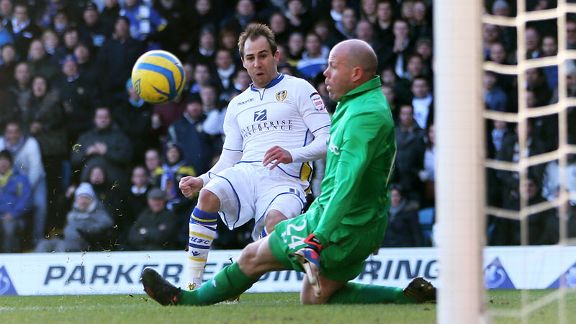 Luke Varney fires Leeds into the lead against Tottenham