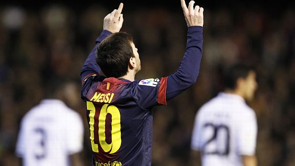 Lionel Messi celebrate after putting Barcelona back on level terms at Valencia from the penalty spot