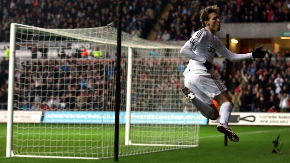 Michu celebrates giving Swansea the lead against QPR