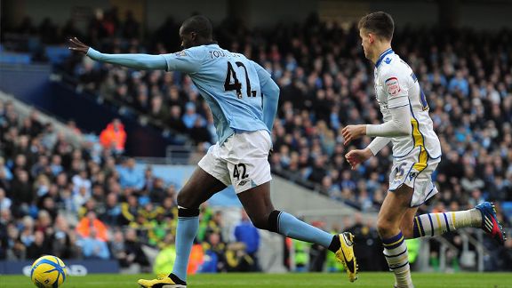 Yaya Toure scores Man City's opening goal in their FA Cup fifth round tie against Leeds