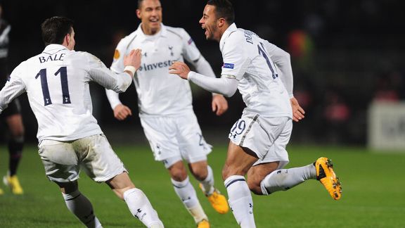 Mousa Dembele celebrates his super strike against Lyon in the Europa League