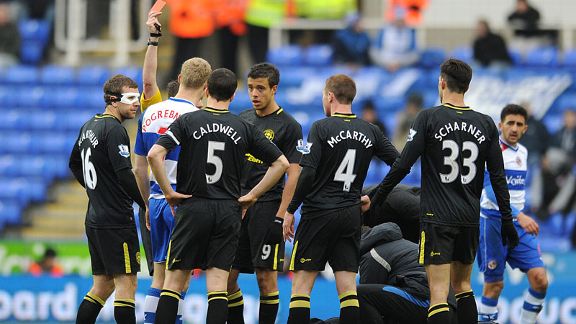 Reading striker Pavel Pogrebnyak is shown a red card against Wigan.
