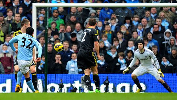Carlos Tevez scores