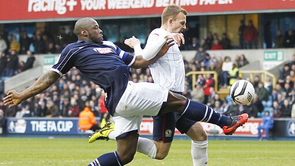 Danny Shittu challenges Jordan Rhodes 