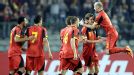 Jan Vertonghen is mobbed after he put Belgium into a 12th minute lead, and they went on to beat Azerbaijan 4-1.