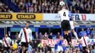 Leon Osman rises to head home Everton's second goal of the game