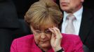 Birthday girl: German chancellor Angela Merkel gets her glasses on