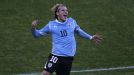 Diego Forlan celebrates after doubling Uruguay's advantage
