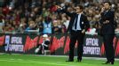 Gary Speed the Wales manager and Fabio Capello of England