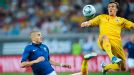 France's Karim Benzema  vies with Romania's Vlad Chiriches