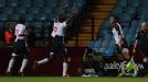 Chris Eagles celebrates with Gael Kakuta and Fabrice Muamba after setting Bolton up for victory against Aston Villa
