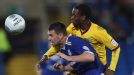 Anthony Gerrard and Zavon Hines battle for possession at the Cardiff City Stadium