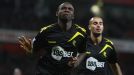 Fabrice Muamba celebrates after putting Bolton into the lead at Arsenal