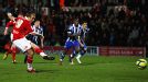 Laurence Wilson of Morecambe scores from the penalty spot