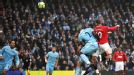 Wayne Rooney scores Man United's first with a fine header