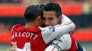 Robin van Persie celebrates with Theo Walcott after opening the scoring