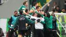 Sporting Lisbon players and management go wild after Xandao's goal